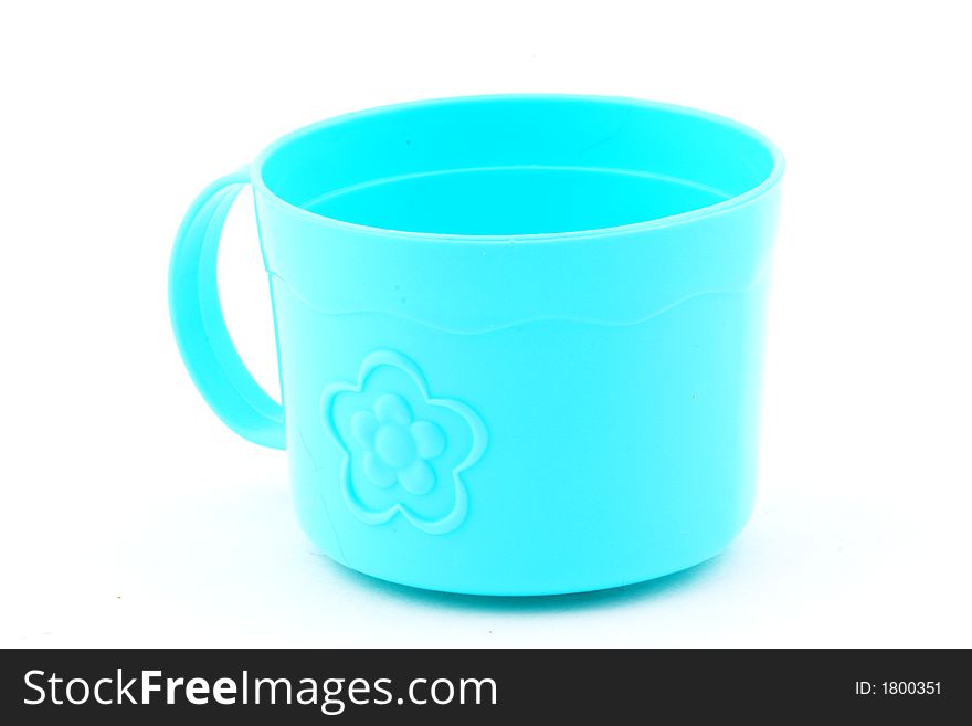 A blue toy tea cup. A blue toy tea cup