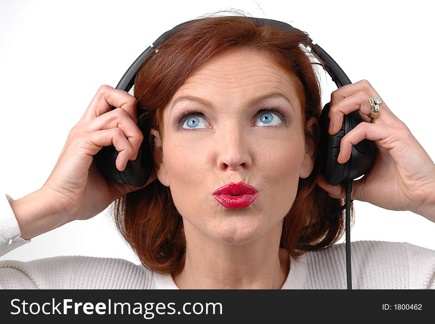 Woman with headphones on a white backgroung