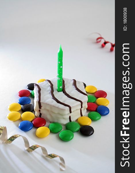 Birthday cake with candle over white background. Birthday cake with candle over white background