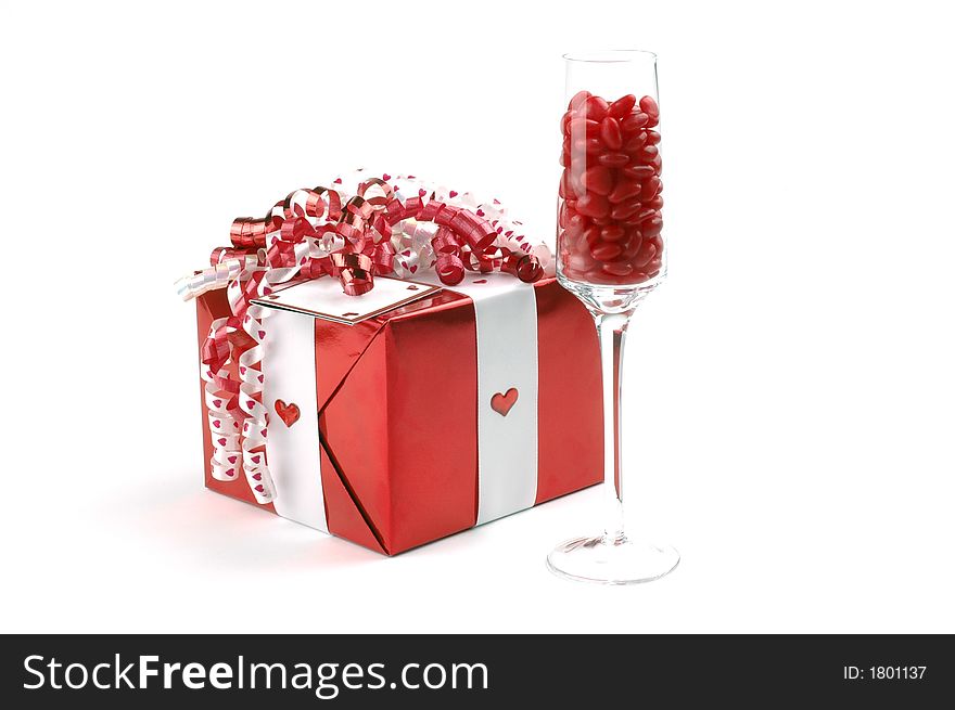 Valentine gift and champagne glass filled with candy. Valentine gift and champagne glass filled with candy.
