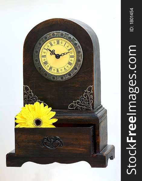Clock with a wooden drawer as bottom. Clock with a wooden drawer as bottom.