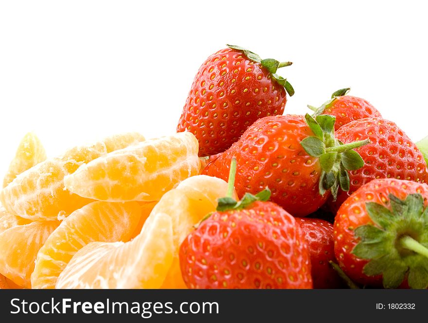 Strawberries and mandarines, close up, on white background, isloated, healthy eating. Strawberries and mandarines, close up, on white background, isloated, healthy eating