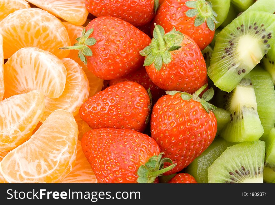 Mandarine, strawberry and kiwi, three colour composition, healthy diet, low fat, low calorie