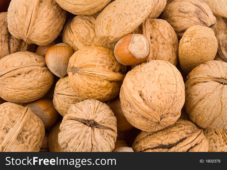 Nuts, walnuts, hazelnuts, almonds, lying flat on pile, mixed