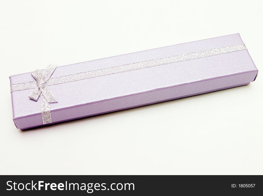 Gift Box with Silver Ribbon against White background