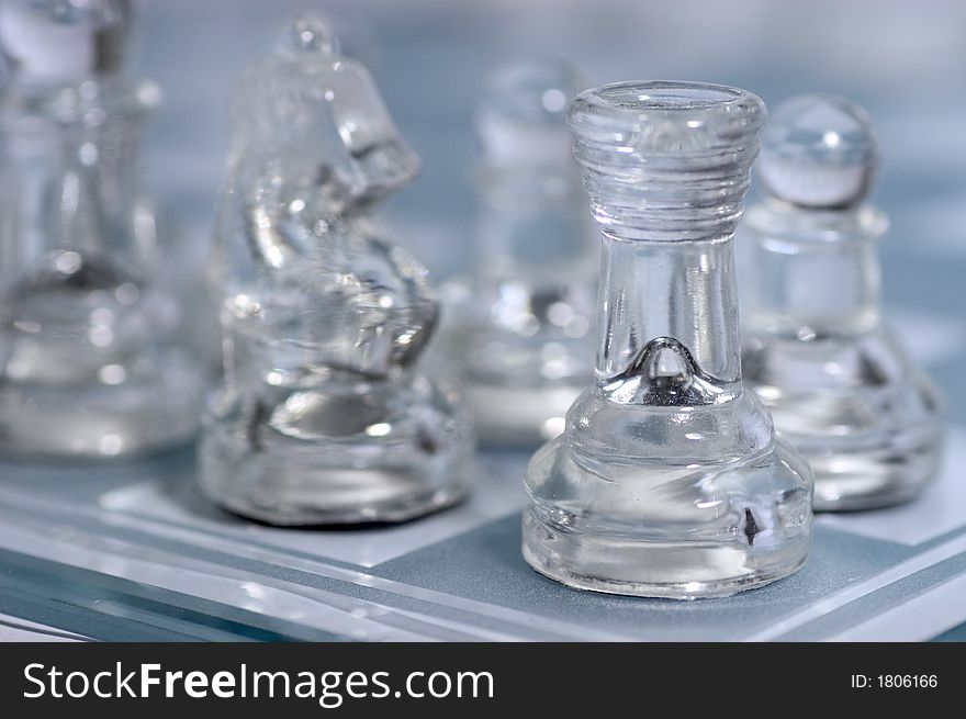 Figures of a glass chess game