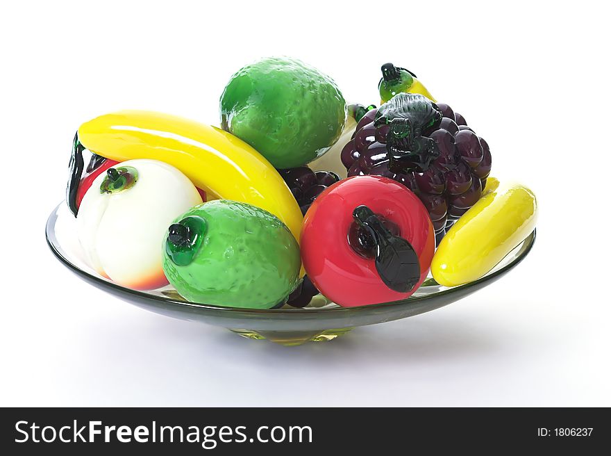 Plate full of glass fruit and veg. Plate full of glass fruit and veg