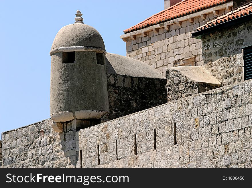 Outer Fortress stone wall with red roof. Outer Fortress stone wall with red roof