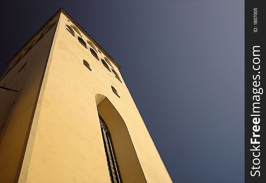 High tower of a church in Tallinn. High tower of a church in Tallinn