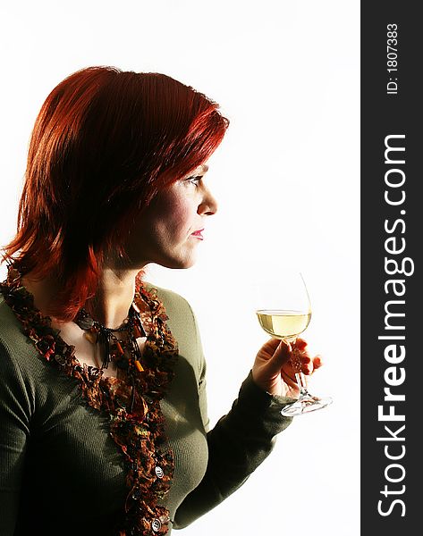 The beautiful woman with a glass of white wine. The beautiful woman with a glass of white wine