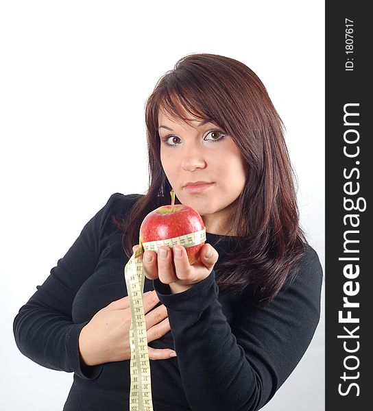 Attractive woman with apple and measure tape on white background. Attractive woman with apple and measure tape on white background