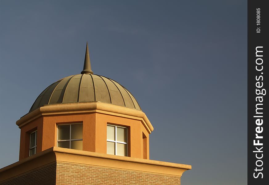 Building dome against blue sky