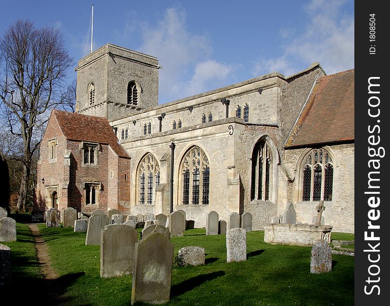 Ancient English Church and Graveyard with Medieval entrance building. Ancient English Church and Graveyard with Medieval entrance building