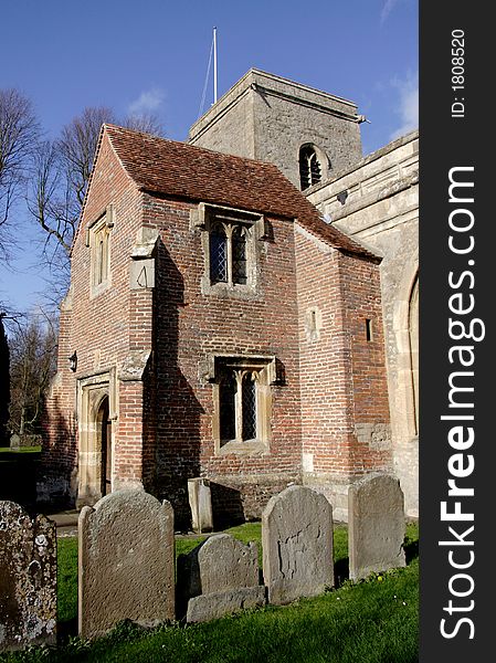 Ancient English Church and Graveyard with Medieval entrance building. Ancient English Church and Graveyard with Medieval entrance building