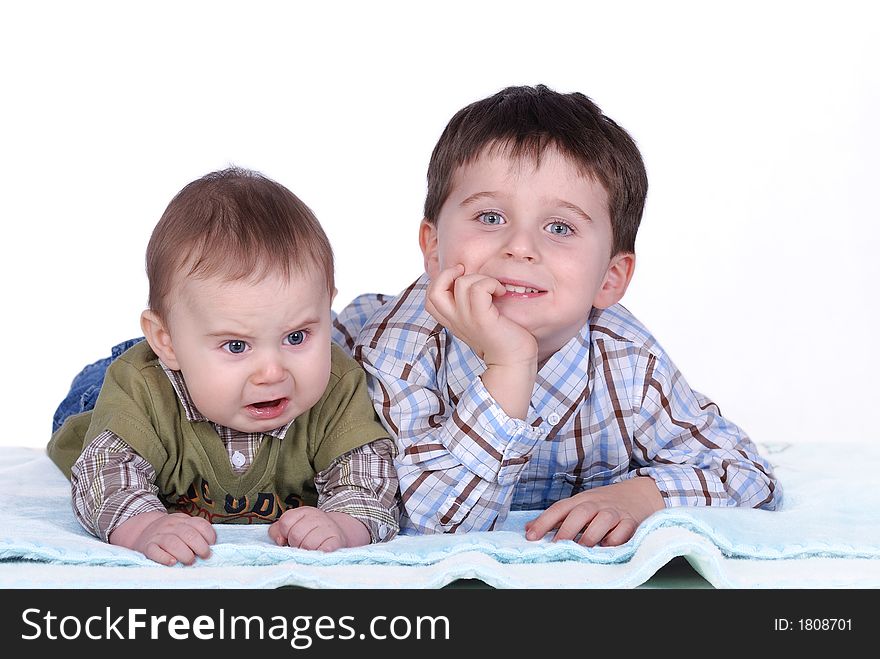 Angry baby and happy boy portrait. Angry baby and happy boy portrait