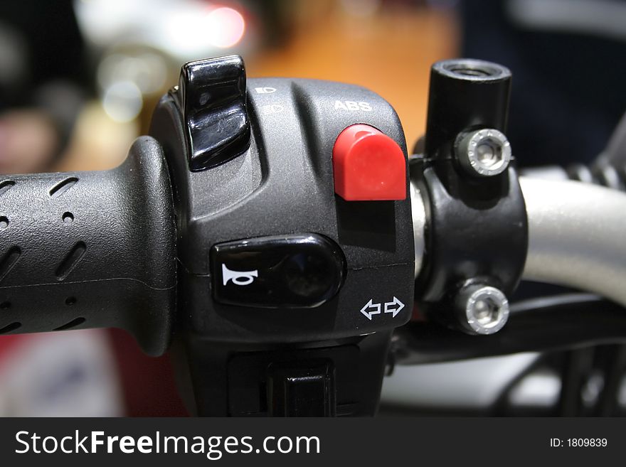 Close up shot of bike handle and controls. Close up shot of bike handle and controls