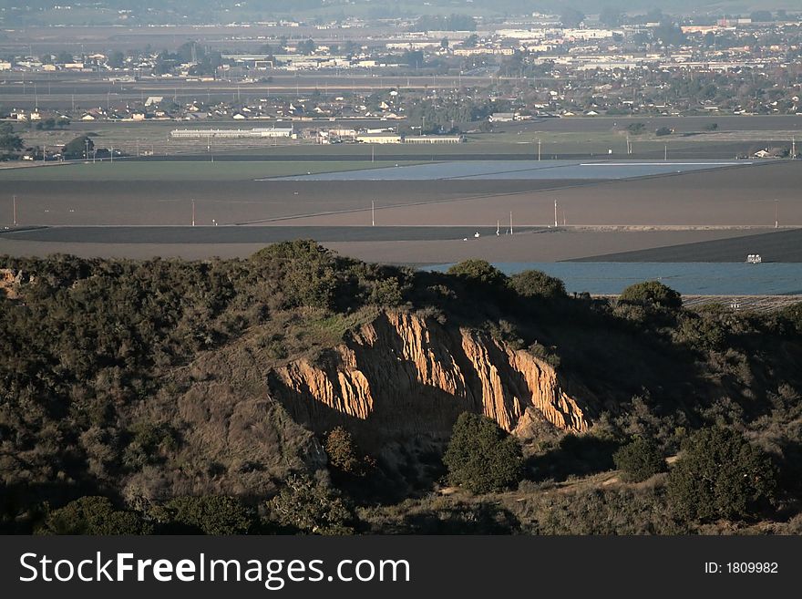Orange colored dirt cliffs in California. Orange colored dirt cliffs in California