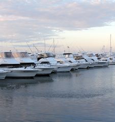 Docked Boats And Yachts At Sunset Royalty Free Stock Images