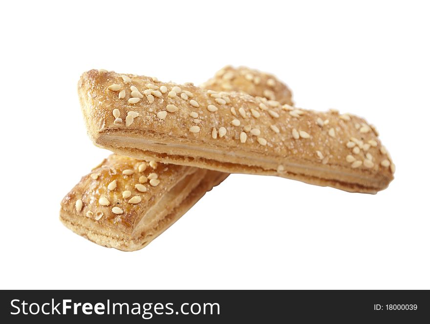 Cookies with sesame seeds on a white background