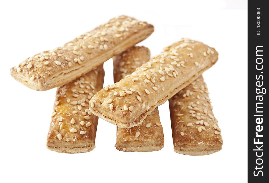 Cookies with sesame seeds on a white background
