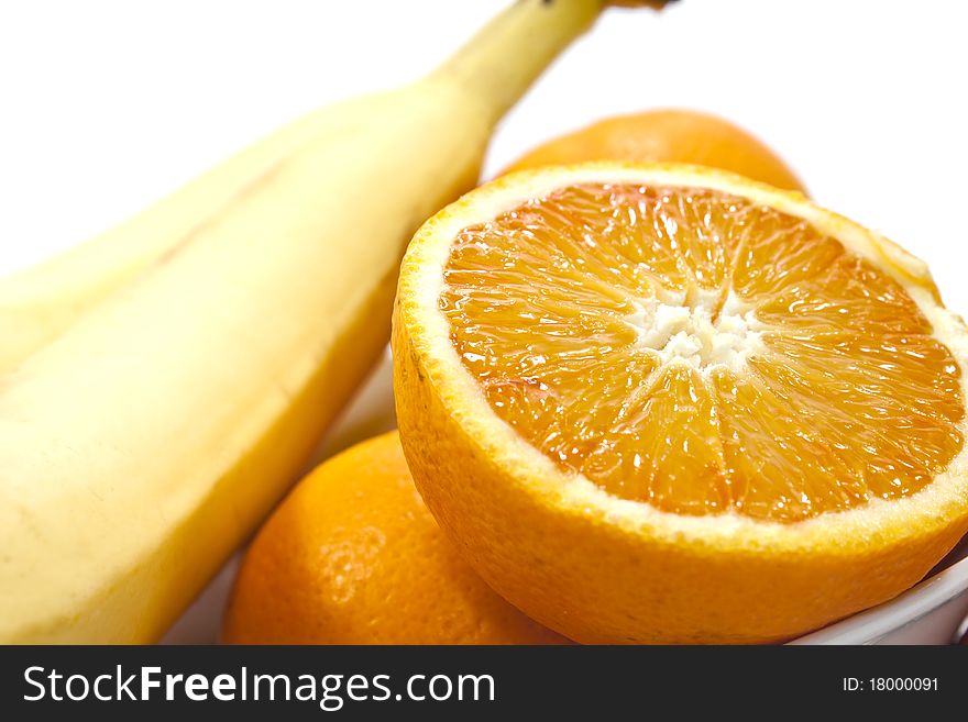 Different fruits on white background, shot close.