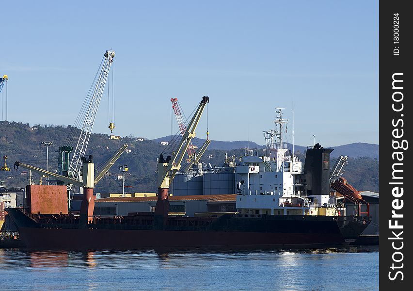 Crane and ship in a port