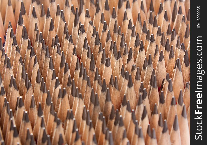 Top view of lots of sharp wooden pencils