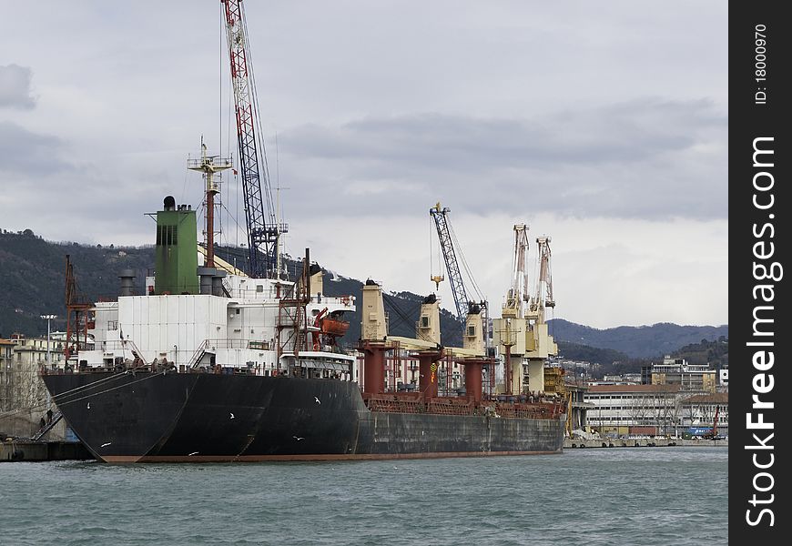 Crane and ship in a port