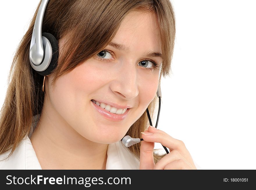 Young female customer service representative in headset, smiling  on a white background