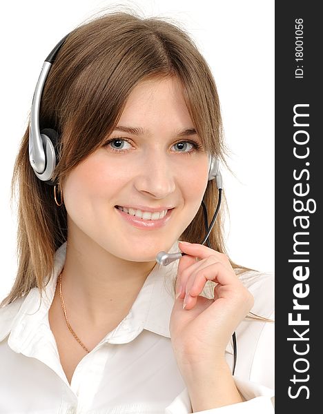 Young female customer service representative in headset, smiling  on a white background