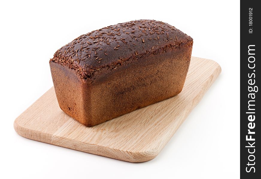 Rye-bread on cutting board isolated