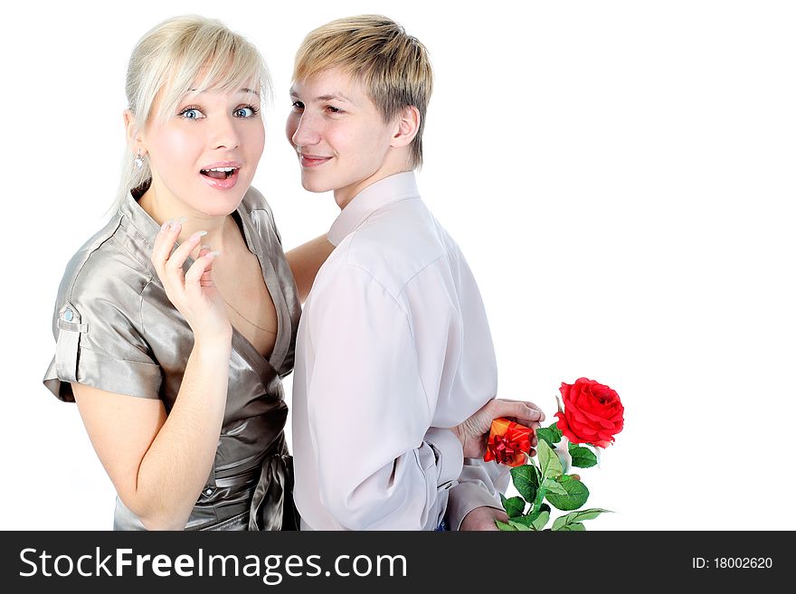 Couple with gift and flower isolated on white