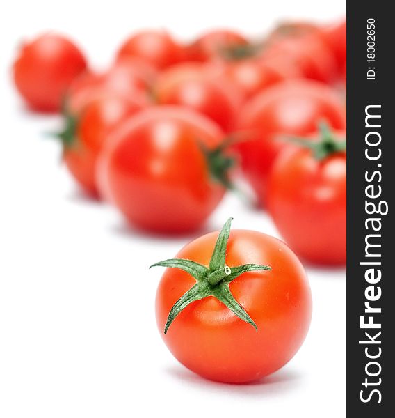 Beautiful ripe cherry tomatoes isolated on white background. Beautiful ripe cherry tomatoes isolated on white background