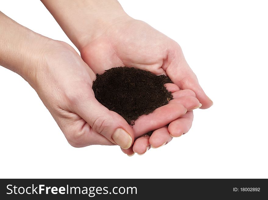 Female hands holding humus soil - close up