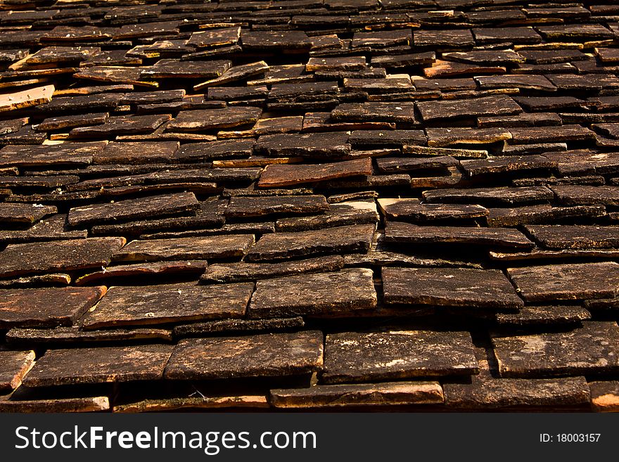 Old roof of the church in Thai Lanna style temple