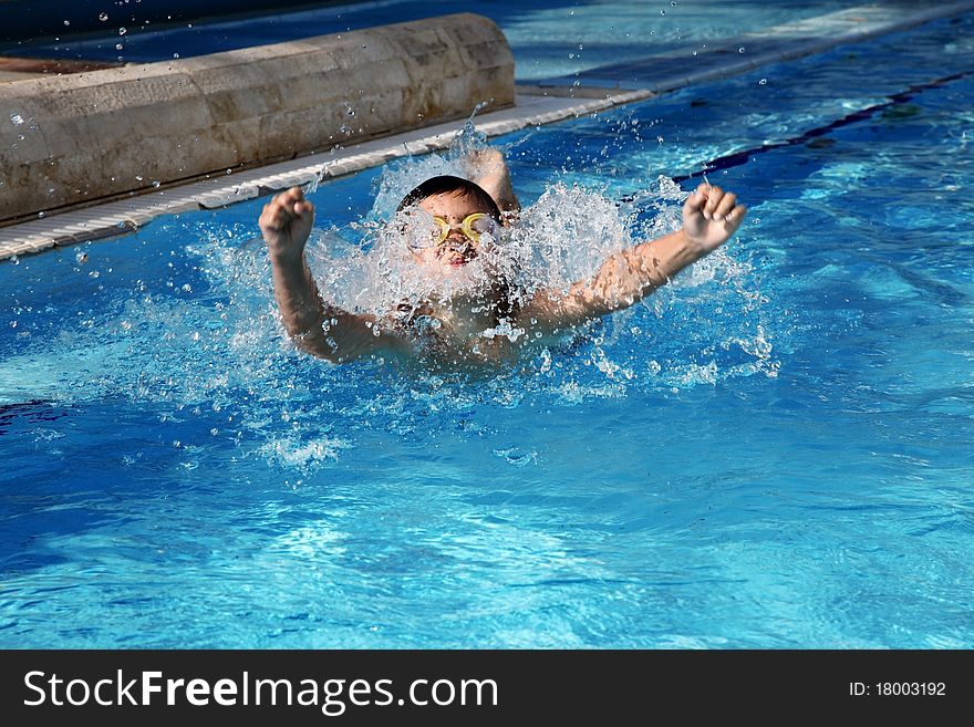 Boy swimming in the pool. Boy swimming in the pool