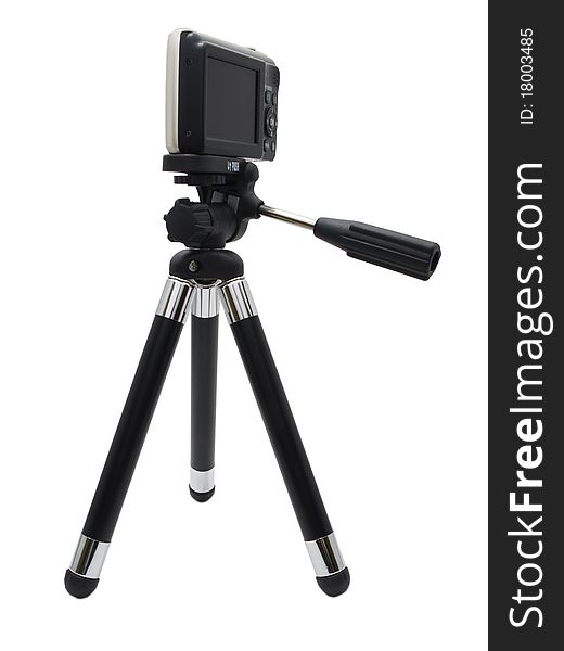 Camera on a tripod isolated on a white background.