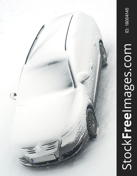 Car outside under a thick layer of snow. Car outside under a thick layer of snow