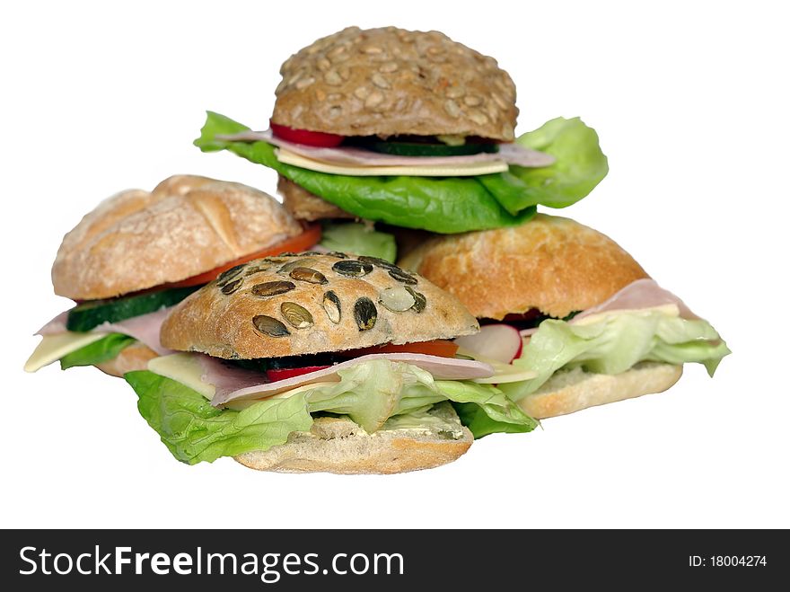 Appetizing sandwich with ham and lettuce on white background