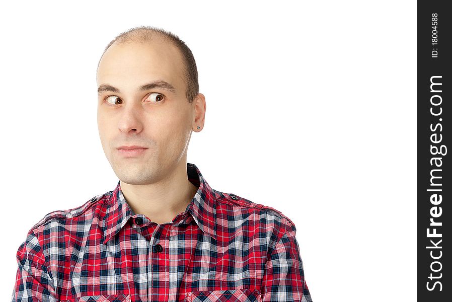 Young man face looking to the copy space. Isolated on white