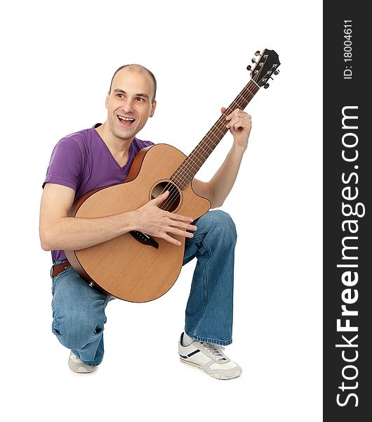 Man with acoustic guitar isolated on white