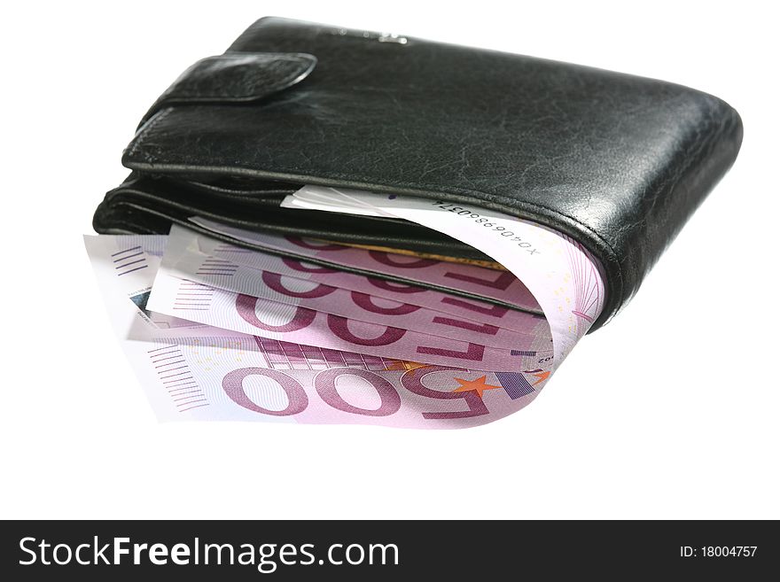 Close-up of five-hundredth euro banknotes in black leather wallet isolated on white. Close-up of five-hundredth euro banknotes in black leather wallet isolated on white