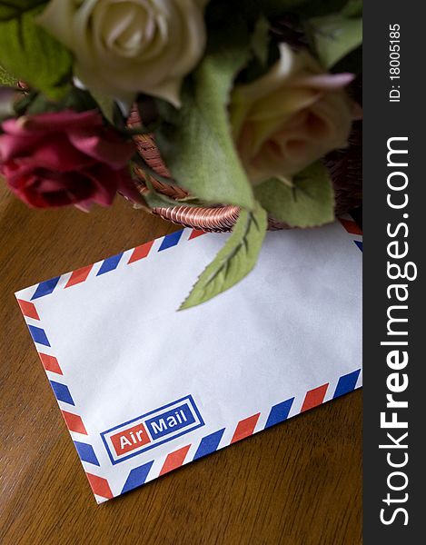 Blank airmail envelope with bouquet of roses. Blank airmail envelope with bouquet of roses