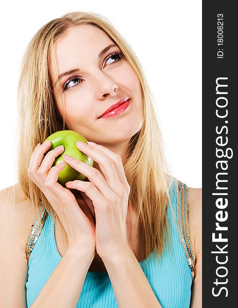Young beautiful woman with green apple against white background. Young beautiful woman with green apple against white background