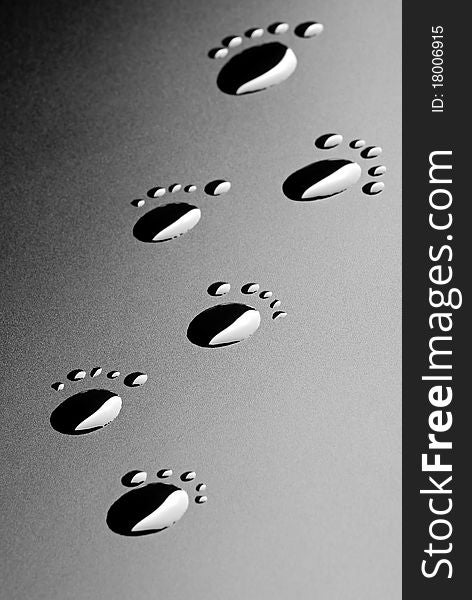 Close-up footsteps of water drops. Close-up footsteps of water drops