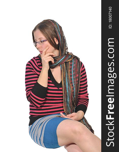 Portrait of a girl in a striped blouse with a beautiful shawl on her head. Portrait of a girl in a striped blouse with a beautiful shawl on her head