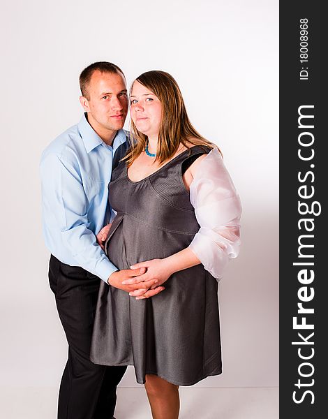 Beautiful couple in waiting for of their child. Beautiful couple in waiting for of their child