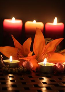 Lilies By Candlelight. Royalty Free Stock Photos Lilies By Candlelight. Royalty Free Stock Photos