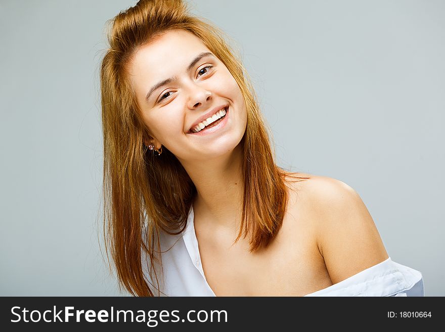 Young woman in a white men s shirt