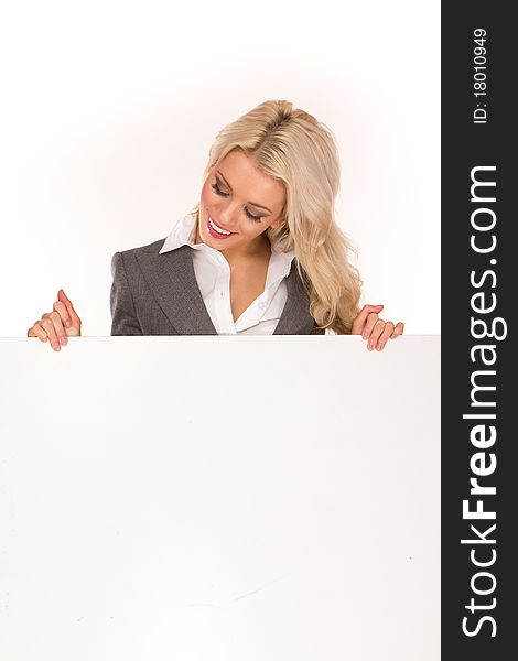 Portrait of a beautiful sexy blonde happy business woman holding a blank billboard. Ready to add text. Portrait of a beautiful sexy blonde happy business woman holding a blank billboard. Ready to add text.